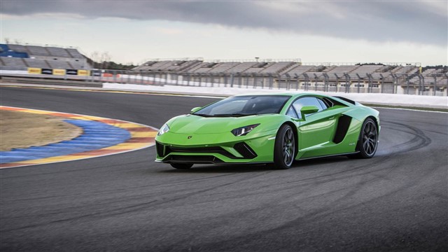 Lamborghini Aventador Brutally powerful and obscenely flamboyant, the Aventador is unburdened by reality.