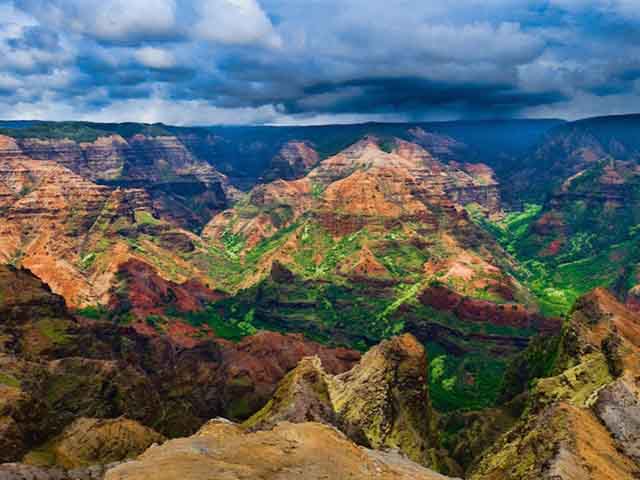 Just a few miles inland of the Na Pali Coast of Kauai is Waimea Canyon. Also known as the Grand Canyon of the Pacific, Waimea Canyon is one of the mos...