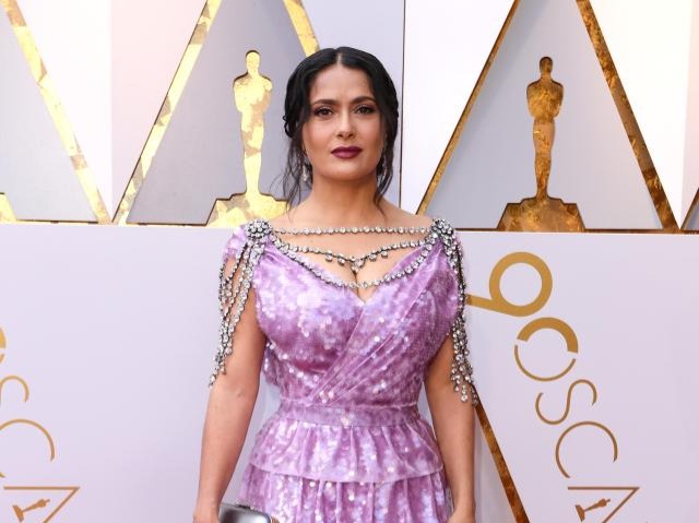Salma Hayek Salma’s custom embellished Gucci dress was the definition of a fashion disaster. The matronly shade, unfathomable neckpiece, confusing silhouett...