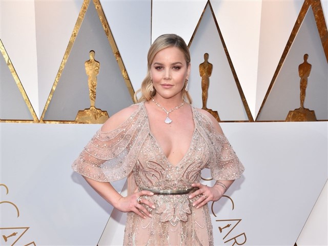 Abbie Cornish Holy moly. This is what happens when a modern star is inspired to dress like a suburban mother-of-the-bride or an extra from the fancy restaurant scen...