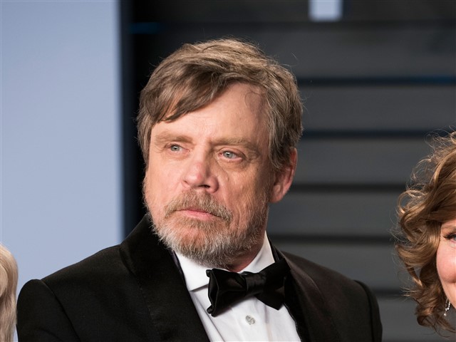 Mark Hamill Mark Hamill held his hands in the air and mimed holding an Oscar.