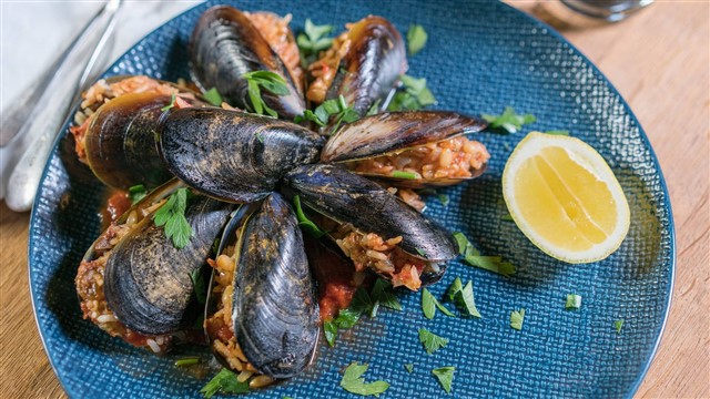 Midye Dolma Mussels filled with herbed rice, currants, and pine nuts are another classic street food, and the vendor will continue handing you a new one with a sp...
