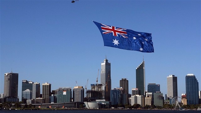 Australia Australia is a country and continent surrounded by the Indian and Pacific oceans. Its major cities are Sydney, Brisbane, Melbourne, Perth, Adelaide ar...